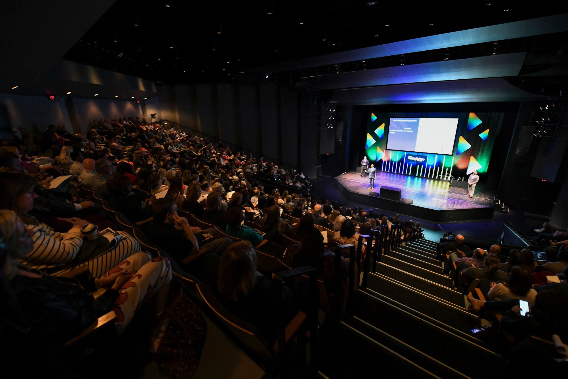 A full Bomhard Theater audience watching a keynote at the 2026 LeadingBetter Summit